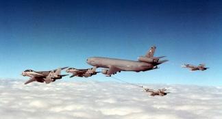 KC-10 air refueling F-14/18s. The KC-10 can transport up to 75 people and about 170,000 pounds of cargo in addition to performing its primary mission of air refueling.