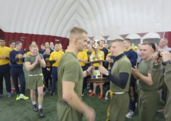 2015 Turkey Bowl By MIDN 2/C Sean Branick 0615, Tuesday November 24 at the Rec Dome, the annual struggle between the Marine Options and Navy Options was taking place.
