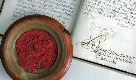 The chatter with which Kaiser Leopold I awarded the academy special privileges in 1687 is made of bound parchment with red satin binding and an imperial seal.