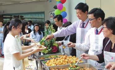 NHG Senior Management serving some 500 nurses in a buffet lunch during NHG Nurses Day 2013.