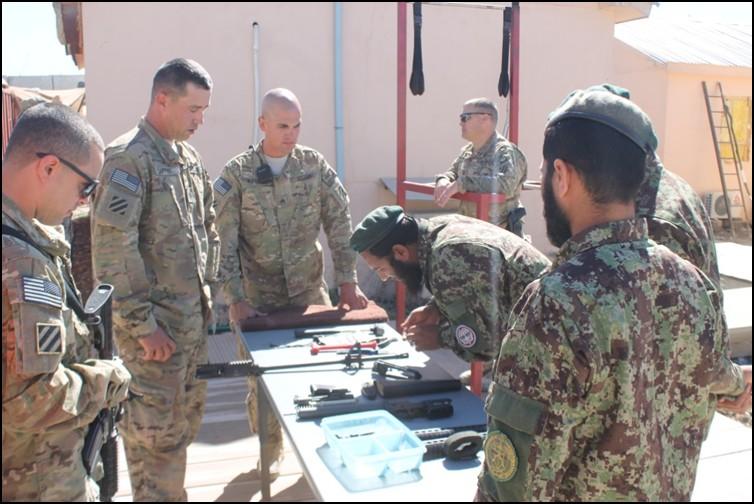 , native and an armament repairer with Company B, 703rd Brigade Support Battalion, 4th Infantry Brigade Combat Team, 3rd Infantry Division, trained Afghan National Army soldiers on how to disassemble