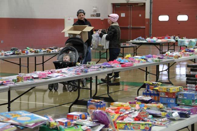 Ripley Post Headquarters TACC Drill Floor in building 11-1. Operation Homefront and Dollar Tree Stores implemented a holiday toy giveaway.