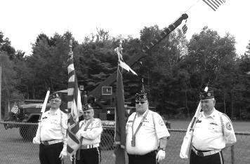 Kennebec County Honor Guard parades the colors at the Oak Hill High School Veterans Recognition Football Game in Wales on Sept. 20, 2014.