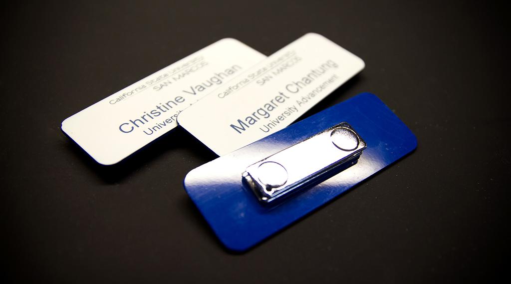 Name Tag Protocol Name tags should be a white plastic with blue lettering and have a magnetic fastener on the back.