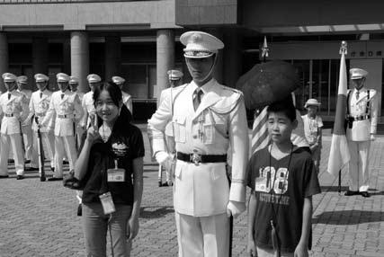 Part III Measures for Defense of Japan Training in an enlistment experience program for female college students Observation of the special honor guard training during a tour at Ichigaya 2.