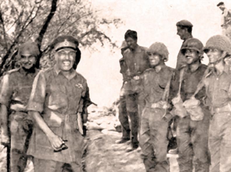 September 2015 General J N Chaudhuri exchanging pleasantries with Indian troops, during a visit to the Khem Karan sector of Tithwal from the Pakistan army.