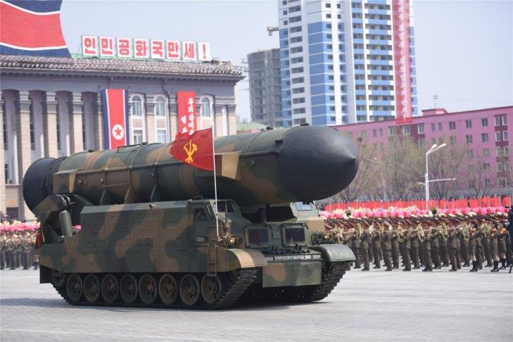 A tracked domestically developed TEL carrying what appears to be the container for the Pukkuksong-2 'medium- to long-range' ballistic missile.