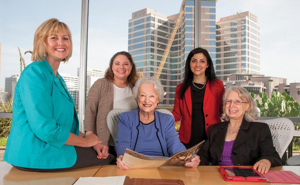 Cohort Two s Mona Cockerham (far left) with Joy Corcione and Seema Aggarwal (standing, left-right), Dean Starck and first-cohort graduate Dr. Angela Nash (seated, far right).