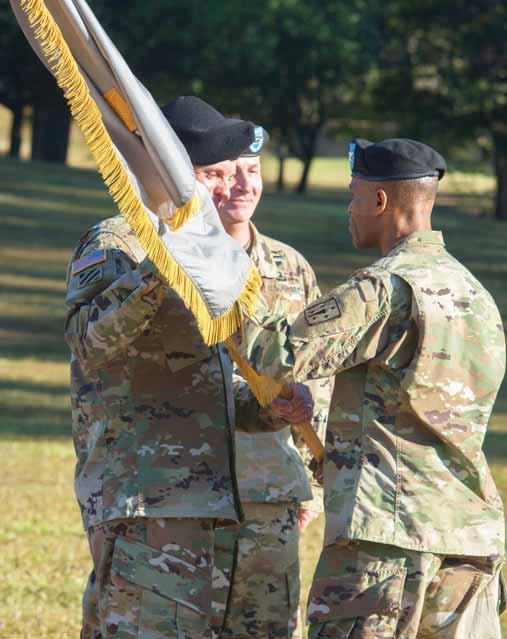 Financial Management School gets new leader By ROBERT TIMMONS Fort Jackson Leader Photo by ROBERT TIMMONS Col. Eric Zellars hands the Financial Management School colors to Col.