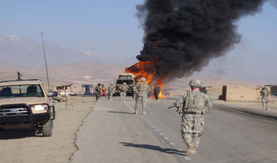 Soldiers from 2nd Platoon, A Co, 1-503d Infantry Battalion, 173rd Airborne Brigade Combat Team (ABCT) and soldiers of the Afghanistan National Army (ANA) 6th Kandak provide security at the scene of
