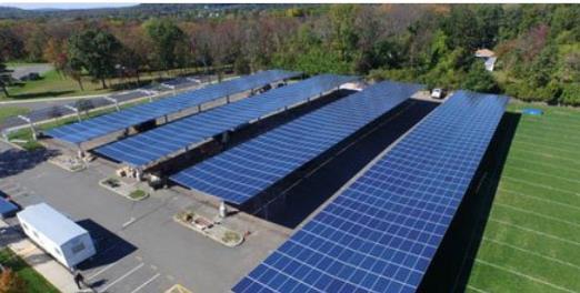 Solar canopy on parking lot Rooftop solar on school Battery Storage Community shelter and warming station twitter.