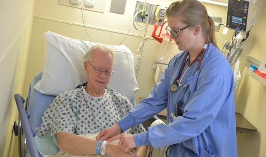 New Knowledge, Innovation & Improvements OSA Danielle Holman, RN secures OSA band to patient in the pre-operative setting.