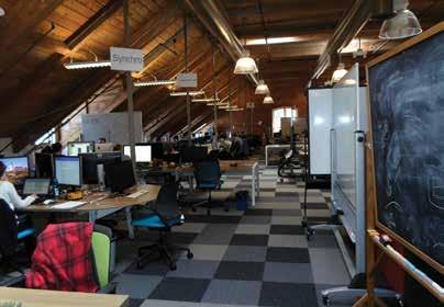 Architectural character like the brick-and-beam style of Intrepid Labs in Cambridge, Mass. is a sought after commodity in coworking centers.