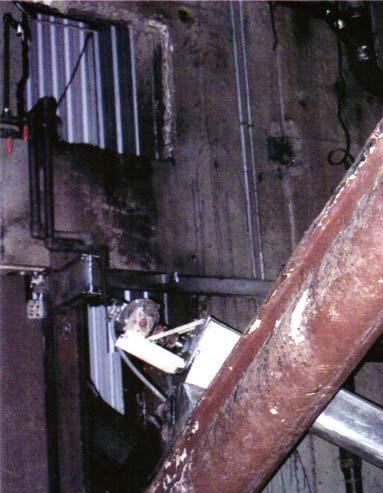 The victim had his feet entangled in an inclined, auger conveyor when it started.
