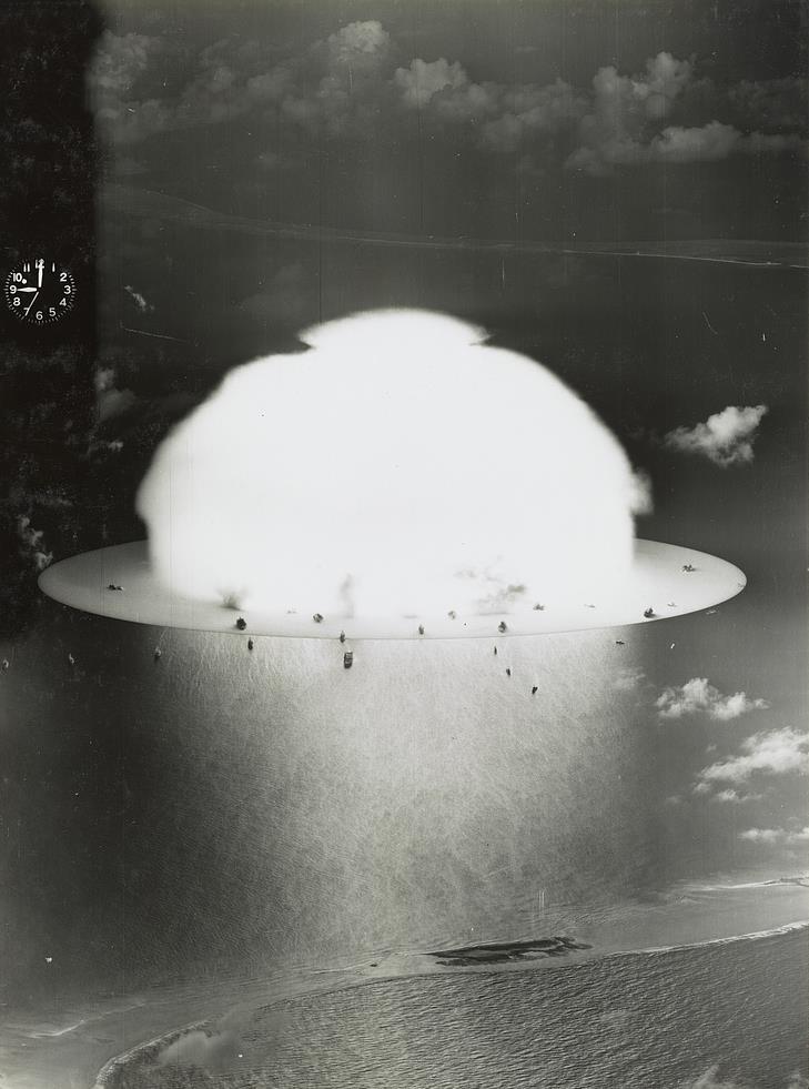 Mushroom cloud with ships below during Operation Crossroads nuclear weapons test on Bikini