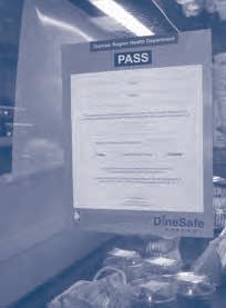DineSafe Durham program. It is possible for an establishment to be charged despite receiving a green (PASS) sign.