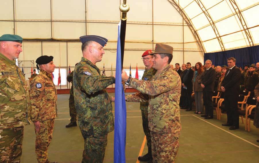 NL AT PICTURE: Afrim Hajrullahu (2) the official transfer of responsibility, the NATO-flag was first transferred from BG Braunstein to Major General Figliuolo, who passed the flag and the accompanied