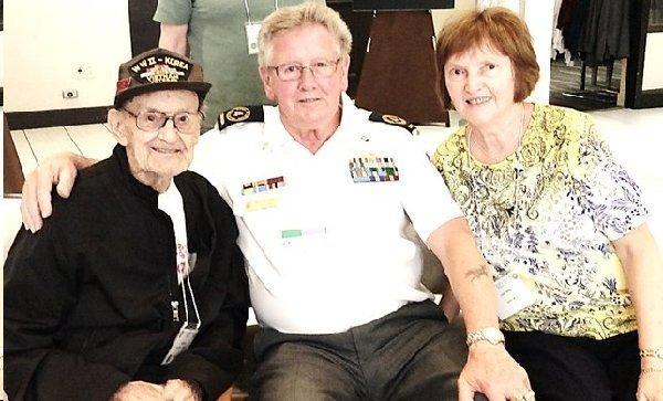 Page 11 of 14 Canadian Veteran Paul Rochon, who was wounded in Korea serving with the Royal 22e Regiment of Canada and his wife Carol share a moment in their hotel s lobby with a famous veteran of