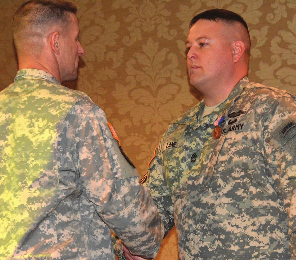 News NCO receives Soldier s Medal By Wallace McBride Fort Jackson Leader Photo by Wallace McBride Maj. Gen. Bradley Becker, left, Fort Jackson s commanding general, congratulates Sgt.