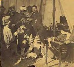 CW7.1 Images and Descriptions of the Civil War (page 11 of 23) Category 3: PEOPLE WHO CARED FOR THE WOUNDED (continued) Image 3C: Hospital scene During the war, female nurses worked alongside male