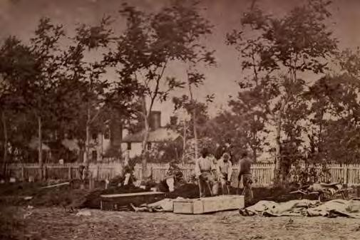 CW7.1 Images and Descriptions of the Civil War (page 22 of 23) Category 6: DEATH (continued) Image 6F: Burying Union dead at hospital in Fredericksburg, Va.