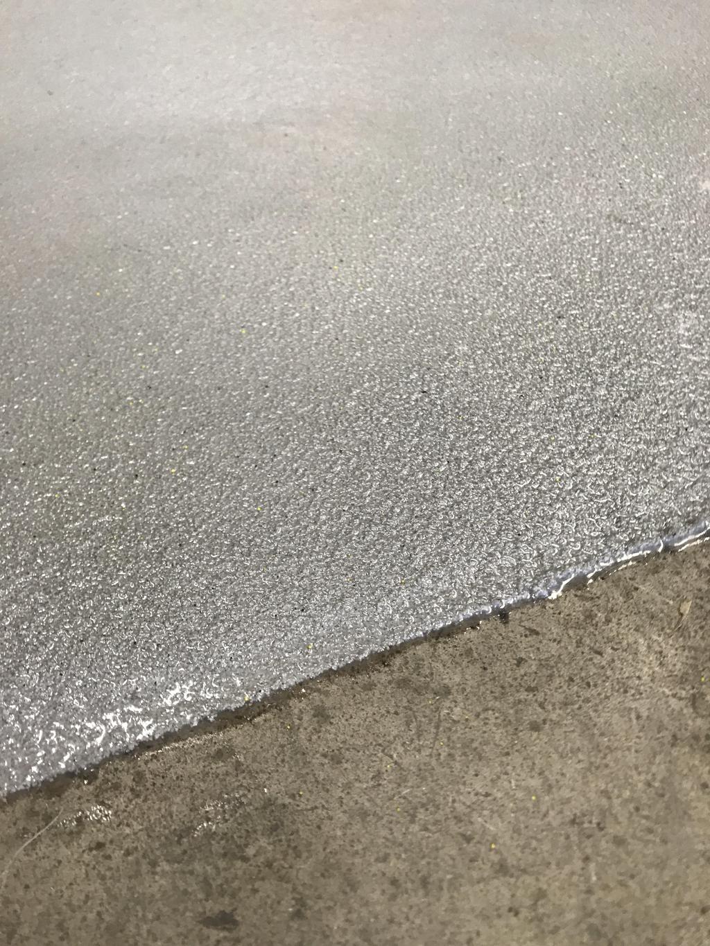 Image Below - Close-up Image of 4 layer TGP quartz aggregate floor coating system (Permanent non-slip floor.