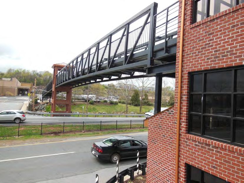 The state-funded Kemper Street Bridge replacement used a locally funded design and was 1.5 years behind schedule as of April 2013.
