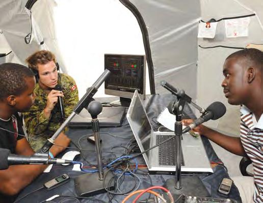 ARTICLES Source: Combat Camera Sergeant Jeremy Meyer, a member of the psychological operations (PSYOPS) team, explains the Joint Task Force Haiti (JTFH) mission during a talk show at Radio Amikal in
