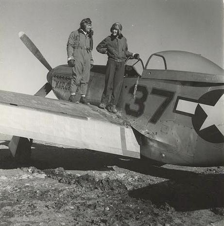 three other African-American fighter squadrons, and in July, 1944, they became a single combat group, the 332 nd.