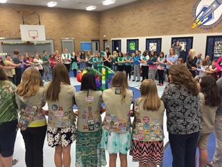 The Girl Scout Mission is to build girls of courage, confidence and character who make the world a better place.