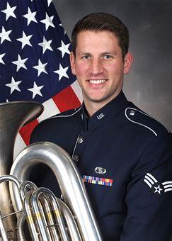 Senior Airman Justis MacKenzie Senior Airman Justis MacKenzie is the Tuba player in the United States Air Force Band of Flight, at Wright-Patterson Air Force Base, Ohio.