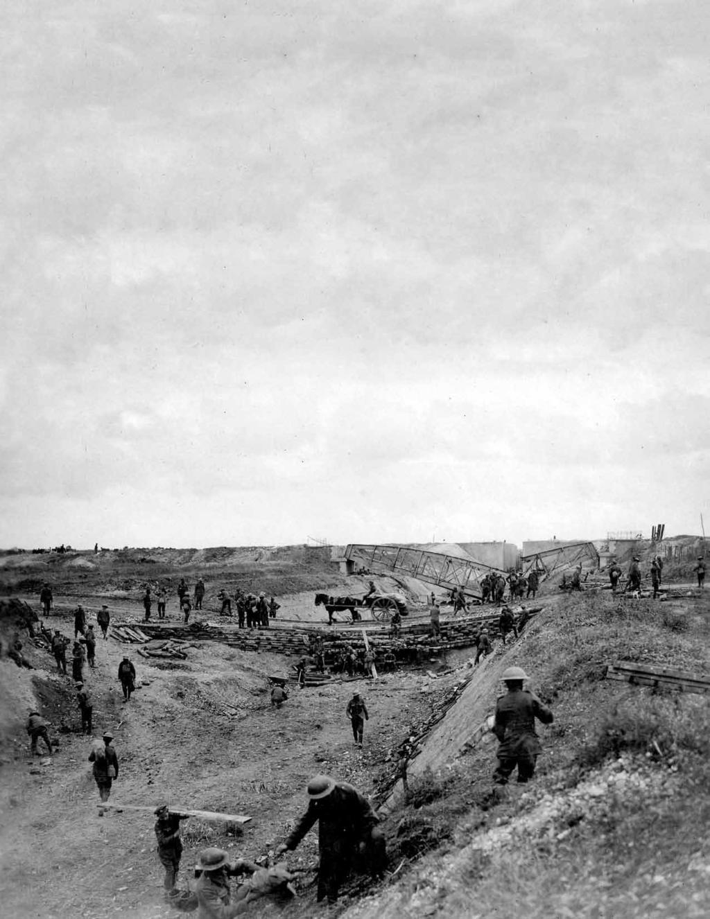 Canadian War Museum 19930012-815 am. This party remained all day filling in the crater with material obtained close by and the road was ready for two-way traffic by 5:30pm.