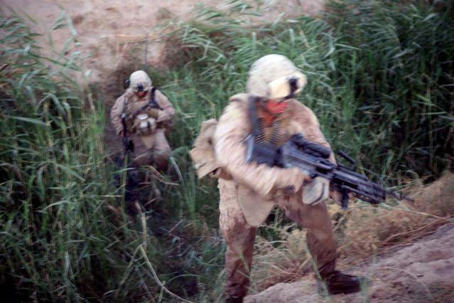 during a patrol through Marjah, Afghanistan, Aug. 15, 2010. Hamilton, 25, is from Carthage, N.Y.