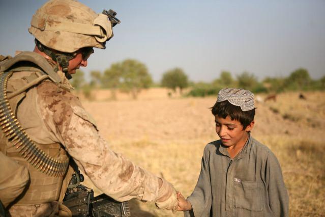 through Marjah, Afghanistan, Aug. 15, 2010. Hamilton, 25, is from Carthage, N.Y. Lance Cpl. Taylor M.