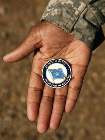 And just like that the longstanding military tradition of giving away a challenge coin is over in the blink of an eye.
