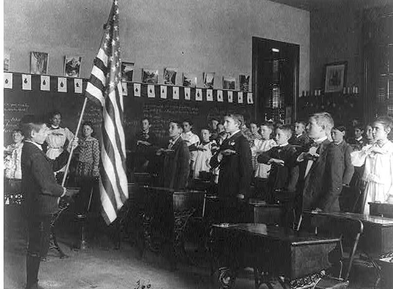 Taking Sides Every morning, in classrooms all over the United States, students stand up and recite the Pledge of Allegiance. It s a tradition that began more than 100 years ago.