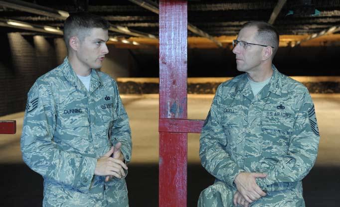 PAGE 6 WINGSPREAD JULY 17, 2015 502nd SFLSG welcomes new 502nd Air Base Wing command chief Staff Sgt. Benjamin Dunning, 902nd Security Forces Squadron armory NCO in charge, speaks to Chief Master Sgt.