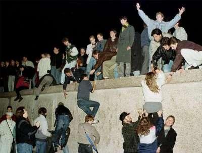 After massive public demonstrations in East Germany and Eastern Europe, the Berlin Wall fell on November 9.