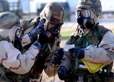 in full mission-oriented protective posture (MOPP) gear: protective