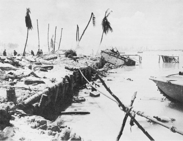 water no longer proves any cover at all. The Japanese player must purchase defenses from his point allotment: sandbag and earthworks and log or concrete pillboxes.