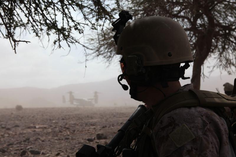 Cpl. Conor Wood, a radio operator with Company I, Battalion Landing Team 3/8, 26th Marine Expeditionary Unit, waits for extraction during a simulated vertical assault in Djibouti, Africa, Oct. 28.