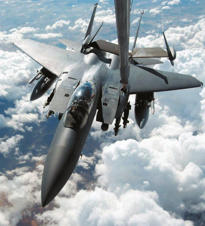 USAF photo by TSgt. Erik Gudmundson USAF photo by A1C Jonathan Snyder An F-15E takes on fuel during a mission over Iraq.