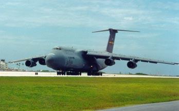 WEATHER Courtesy of Aeromet (Photo by Mike Johnson) Up, Up and Away A C-5 Galaxy from Hickam Air Force Base takes off Tuesday from Bucholz Army Airfield.