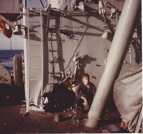 The 3rd missile hit her very near the site of the first and the warhead passed through to the No 2 Missile Director. One more sailor was killed and several wounded by part of the missile warhead.