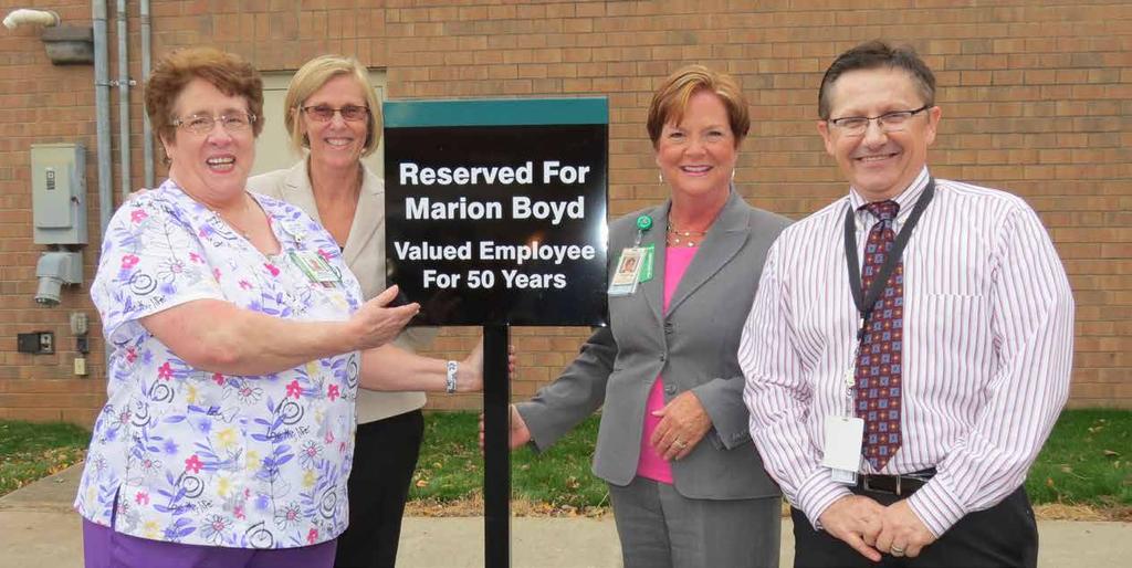 2 Join Us Light The Tree to benefit Commonwealth Health Free Clinic and The Dental Clinic In honor of her 50 years of service, a parking spot at The Medical Center was dedicated to Marion Boyd (far