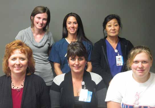 Corpcare; Jo Ward, 4C Nursing. Seated, left to right: Carl Binion, EMS; Alison Henderson, 4D Nursing.