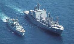 The MSDF supply ship Oumi (right) conducting mid-ocean refueling of a Canadian ship (left) in the Indian Ocean See References 56, 57 Since May 2003, in light of United Nations Security Council