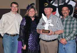 The representatives received plaques on behalf of Sydney and Randy that recognized the men s service to both the military and the chapter. A local newspaper featured the event in a brief article.