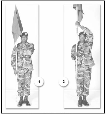 H-5. RAISED GUIDON On the preparatory command Present of Present, ARMS and Eyes of Eyes, RIGHT, raise the guidon vertically, by grasping the staff with the right hand.