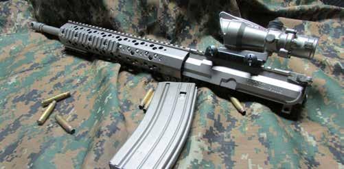 handguard, barrel (with Nitromet bore) in your choice of 1:7 or 1:8 twist and compensator.